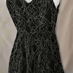 Dolce & Gabbana-style elegant dress. Quite flattering.